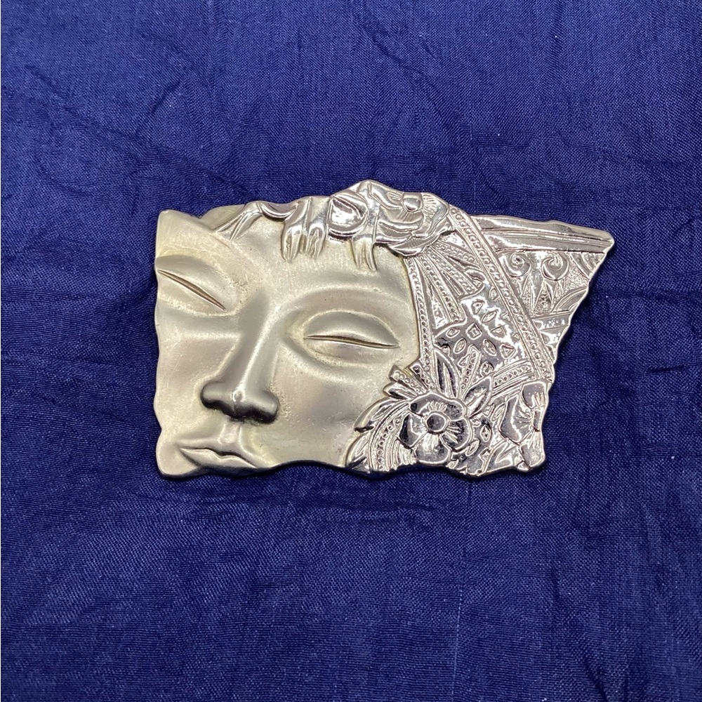 JJ marked silver tone metal face brooch 1.5” x  2.5”